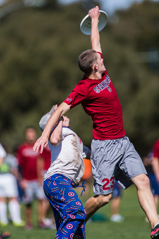 Stanford's Andrew Bleich makes the catch over Texas A&M Mat Bennett at the Stanford Invite.