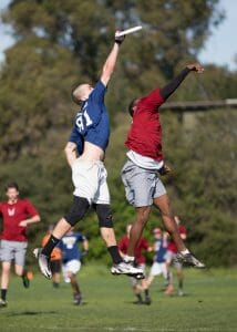 Pittsburgh's Tyler Degirolamo gets up against Carleton's Jesse Bolton at the Stanford Invite.