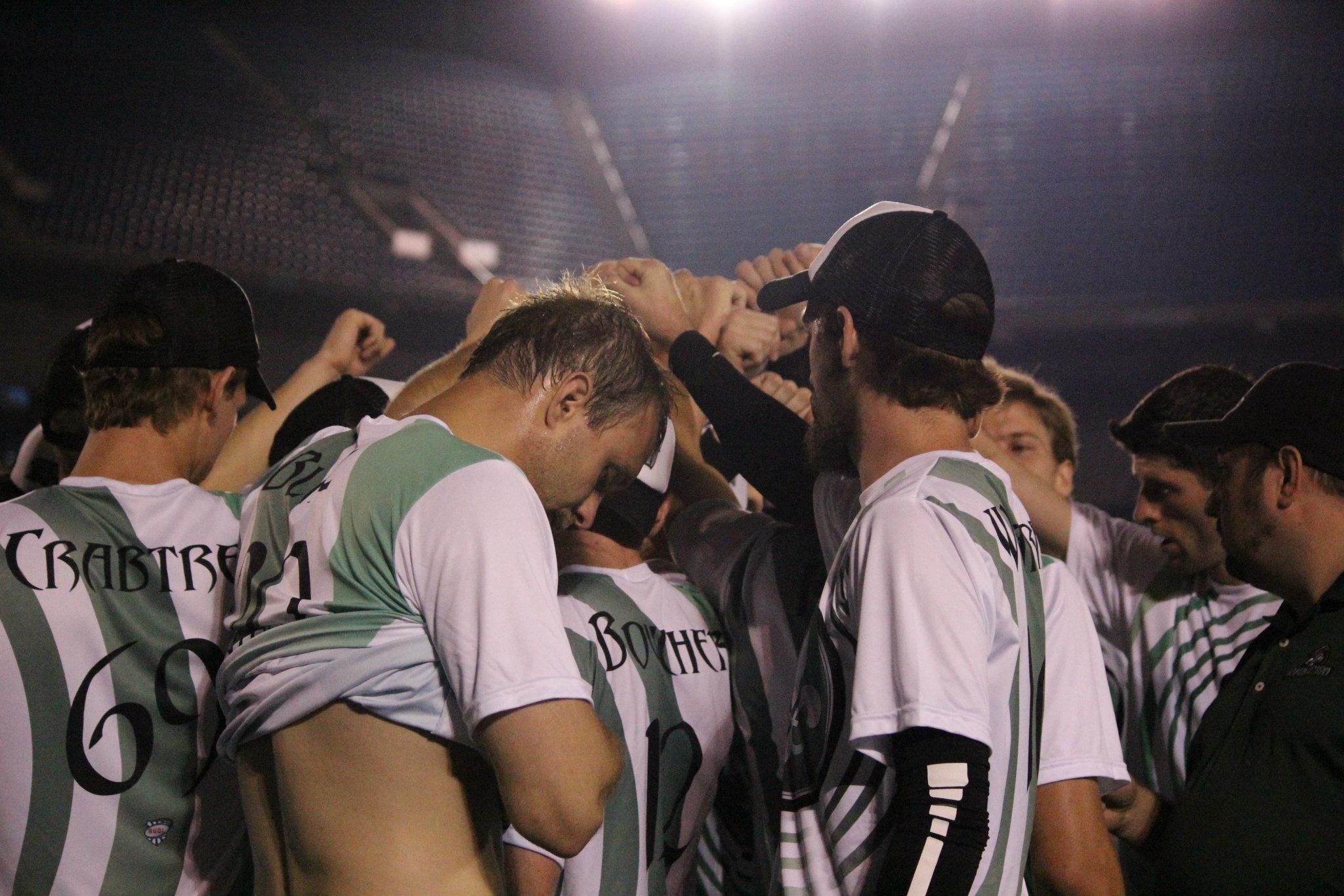 The AUDL's Cincinnati Revolution huddling up.