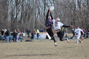 UNI's Ryne Stajcar gets up over the defender.