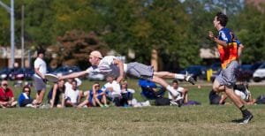 Madcow's Jesse Wohl extends his long frame for a layout grab at Great Lakes Regionals