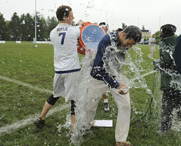 Players douse Pittsburgh coach Nick Kaczmarek after the team won its second straight College National Championship.