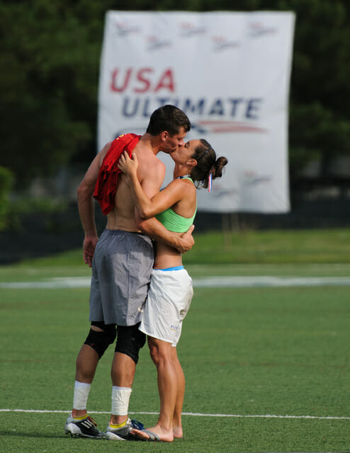 Beau Kittredge and Kaela Jorgenson kiss after both players' teams emerged victorious at the 2013 US Open. Photo: Kevin Leclaire -- UltiPhotos.com
