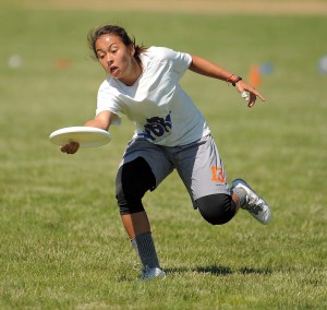 Virginia's Alika Johnston grabs the disc at the 2014 College Championships.
