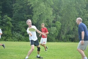 Bill Nye throwing a forehand.