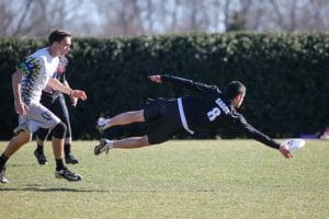 UMass' Ben Sadok saves possession.