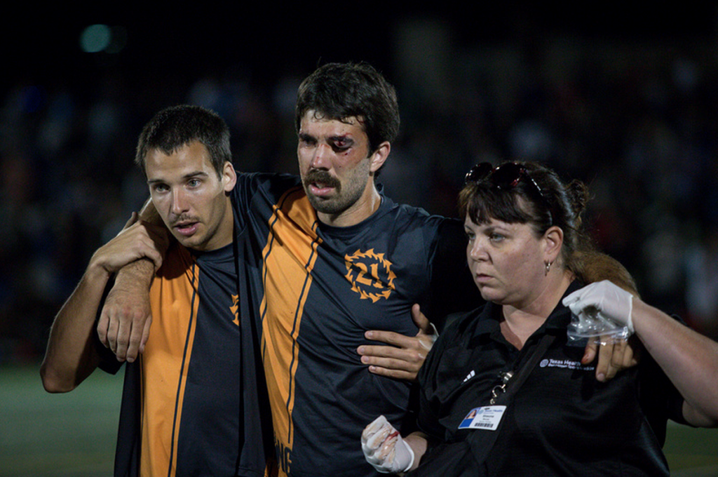 Jon Nethercutt comes off the field with an eye injury. Photo: Christina Schmidt -- UltiPhotos.com