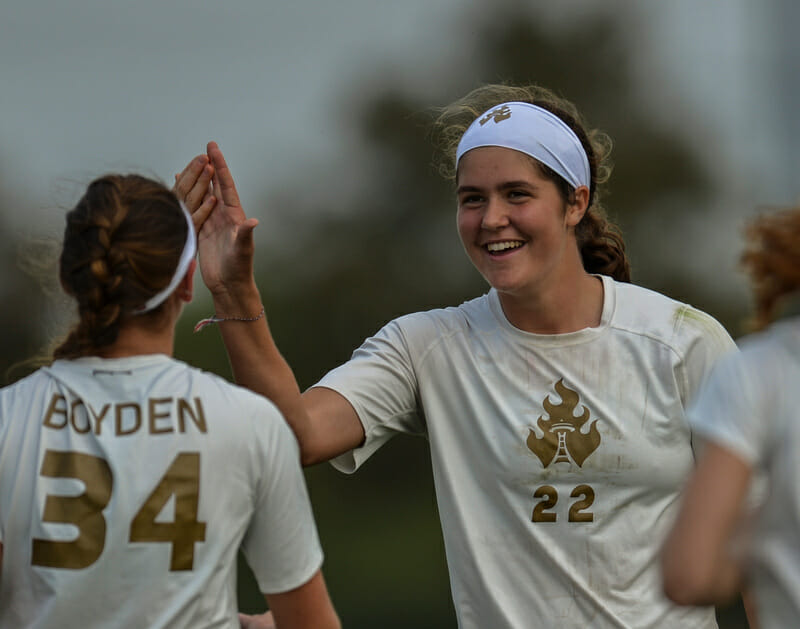 Jaclyn Verzuh (Seattle Riot #22) high fives Geli Boyden (#34). Photo: Brian Canniff -- UltiPhotos.com