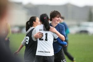 Whitman's Alex Hardesty and UBC's Ellen Au-Yeung embrace. Photo: Brian Chu -- UltiPhotos.com