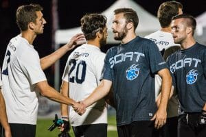 Mark Lloyd and Kurt Gibson shake hads after the 2014 Club Championship semifinals. Photo: Daniel Thai -- UltiPhotos.com