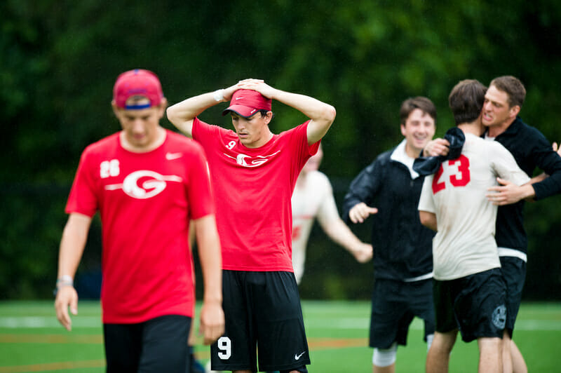 Georgia's Sam Little takes in the loss as Harvard celebrates. Photo: Kevin Leclaire -- UltiPhotos.com