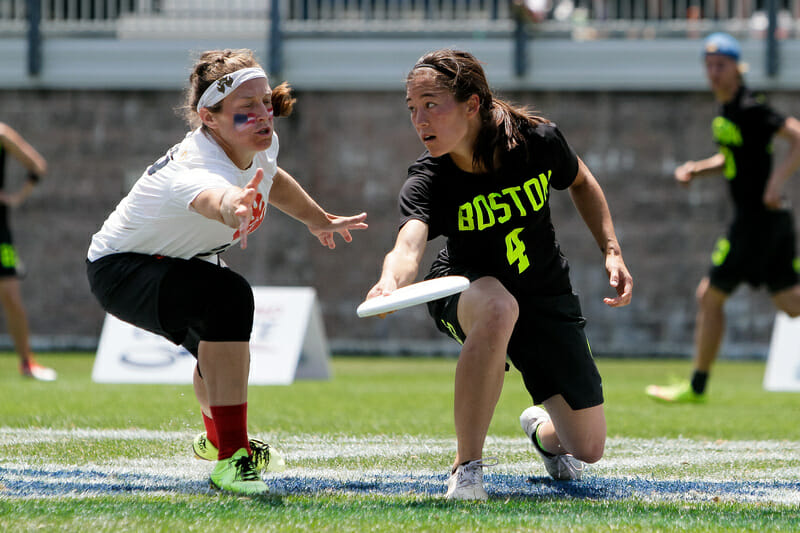 Brute Squad's Liên Hoffmann throws a big fake against Seattle Riot in the 2016 US Open Final. Photo: Burt Granofsky  --  UltiPhotos.com