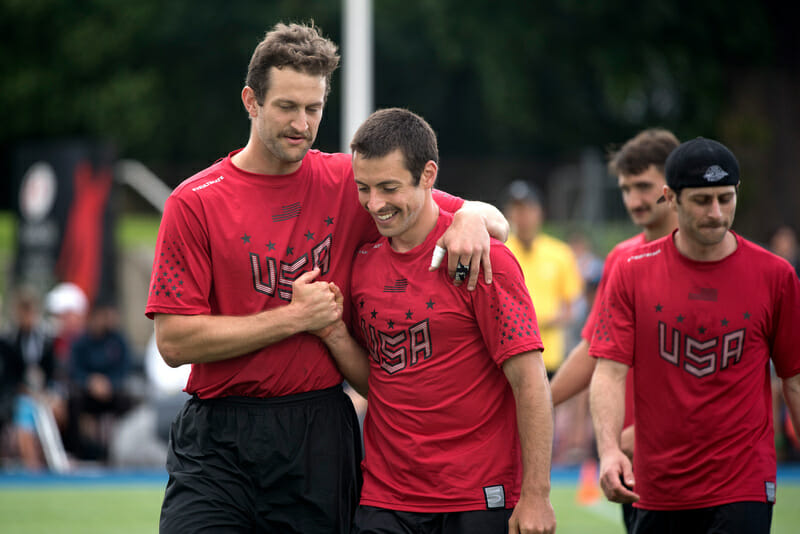 Nick Stuart with teammate Joel Schlachet during the gold medal game at WUGC 2016. Photo: Jolie J Lang -- UltiPhotos.com