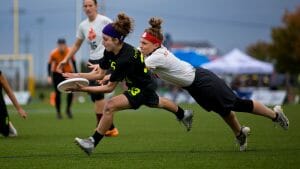 Brute Squad's Laura Bitterman catches a goal past a bidding defender at the 2016 Club Championships.