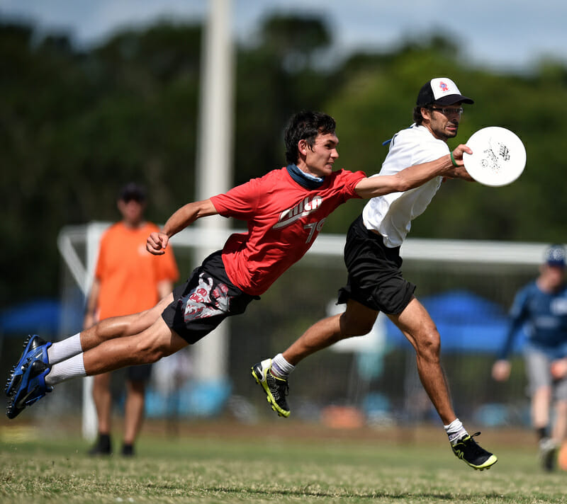 AMP's Michael Ing extends to make the play at 2017 Club Nationals.