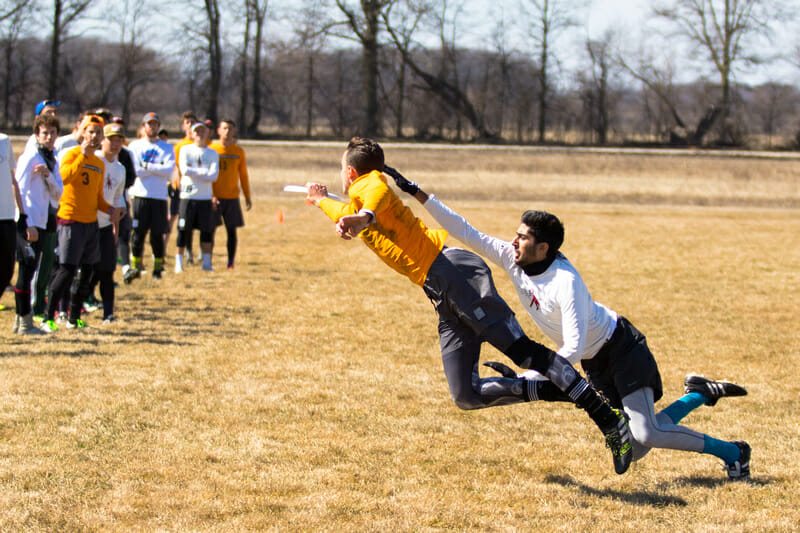 A Wheaton player bids for the grab at 2018 DIII Midwestern Invite. 