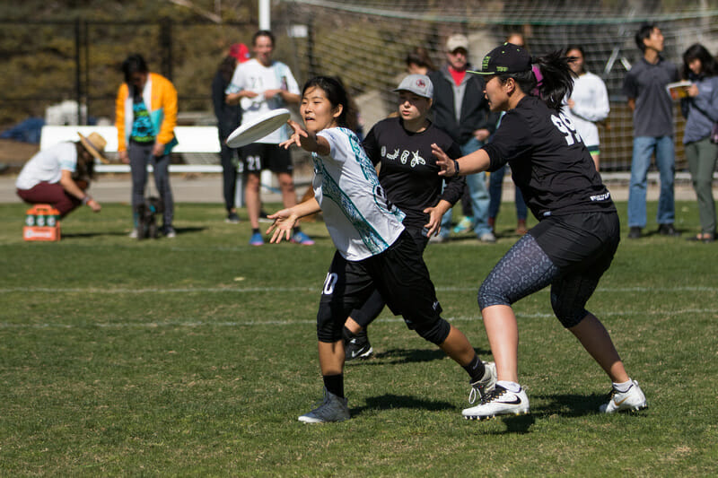 UC San Diego's Kelli Iwamoto let's go of an offhand backhand at the 2018 Presidents' Day Invitational.