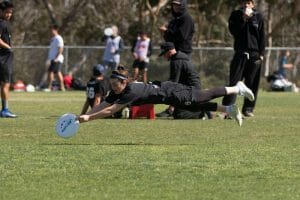 Texas's Ivy Harrison makes a layout grab at the 2018 Presidents' Day Invitational.