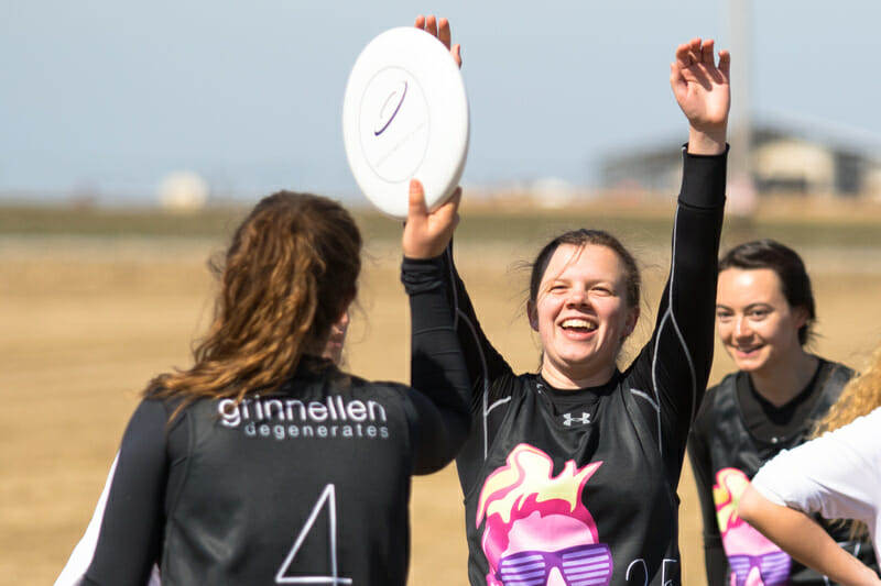 Grinnell celebrates during the final of the 2018 D-III Midwestern Invite. 