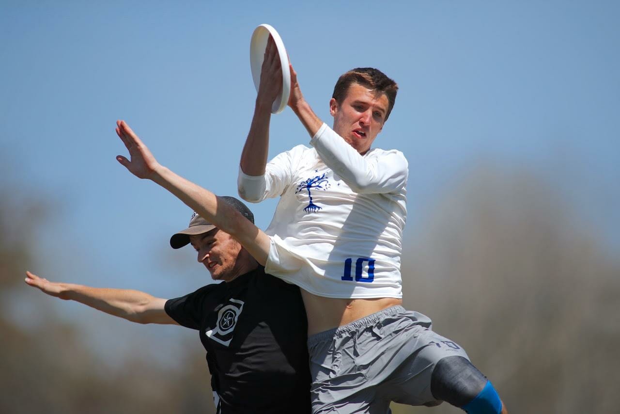 Carleton's Henry Fisher makes one of his many plays in the air in the final of Easterns 2018.