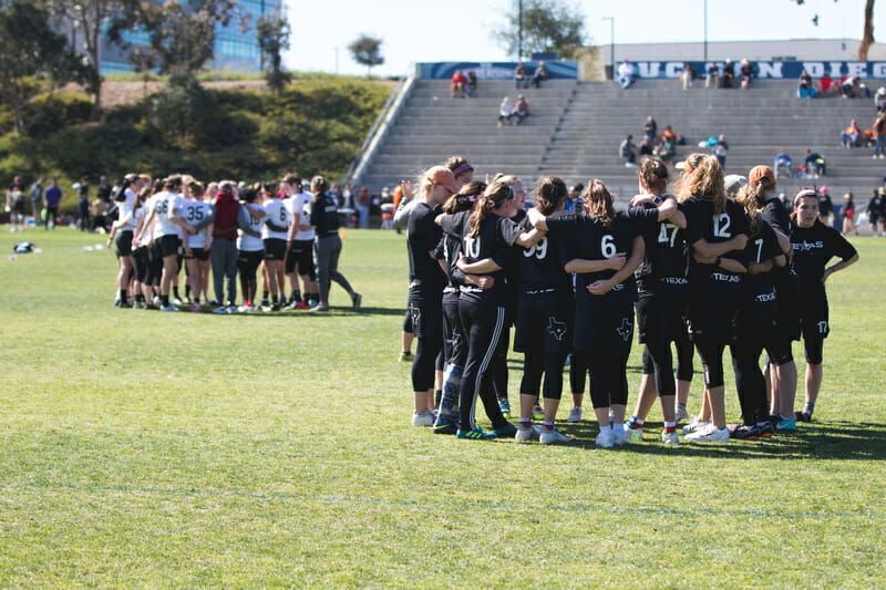 Texas and Colorado in their respective huddles at the 2018 Presidents' Day Invitational.