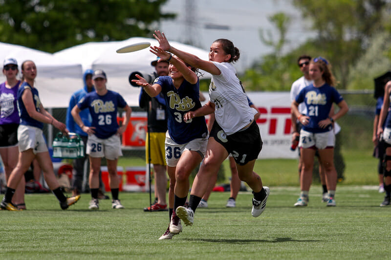 Colorado's Saioa Lostra pressuring Carolyn Normile against Pittsburgh in the semifinals of the 2018 College Championships.