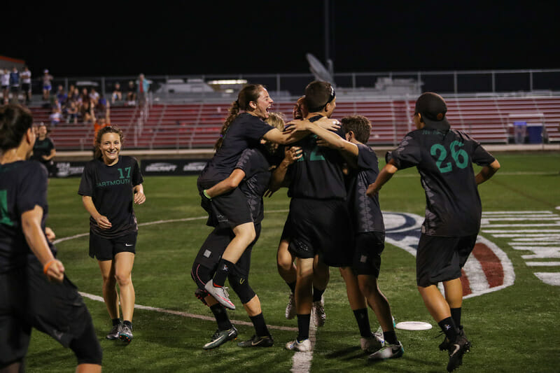 Dartmouth celebrates a Championships at the 2018 D-I College Championships.
