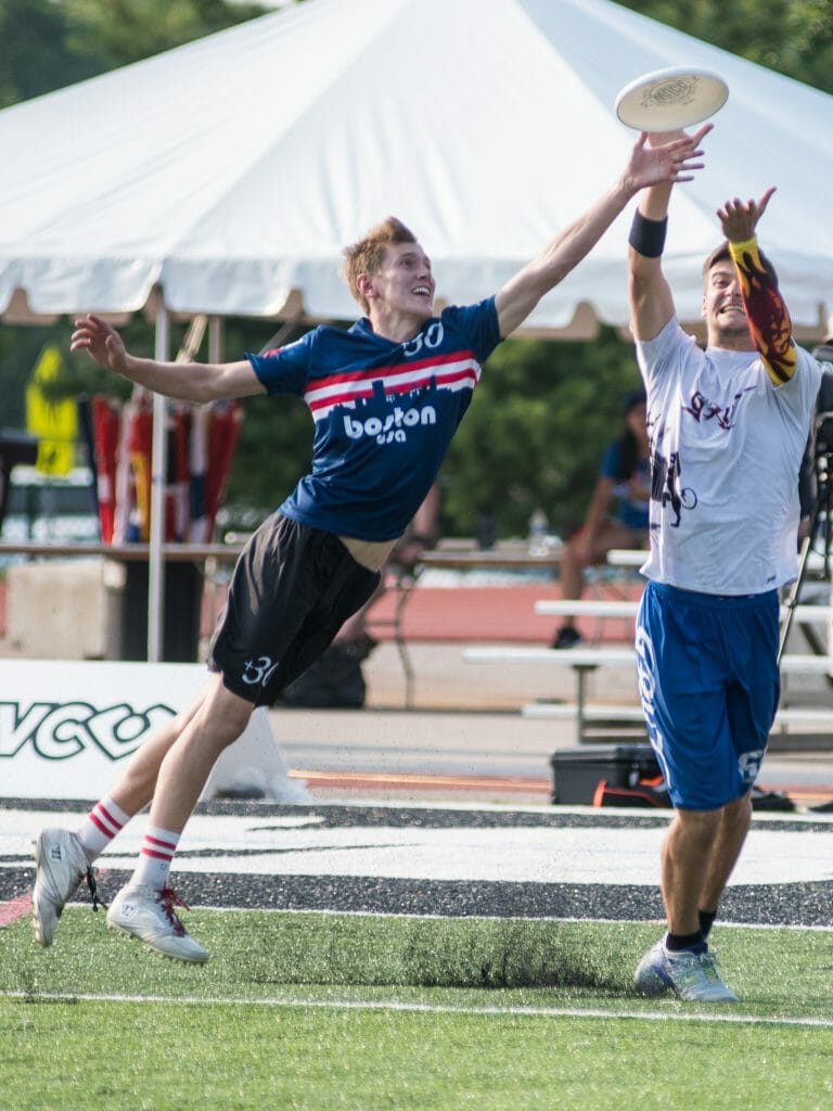 Kyle Johnson, #30 Wild Card (USA Mixed) bids for the block - GRUT (Netherlands Mixed) vs Wild Card (USA Mixed) - Pool Play at the World Ultimate Club Championships.