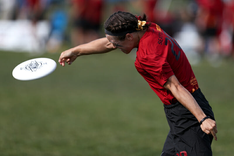 Riot's Charlie Edie releases a powerful backhand in the quarterfinal round of WUCC 2018.