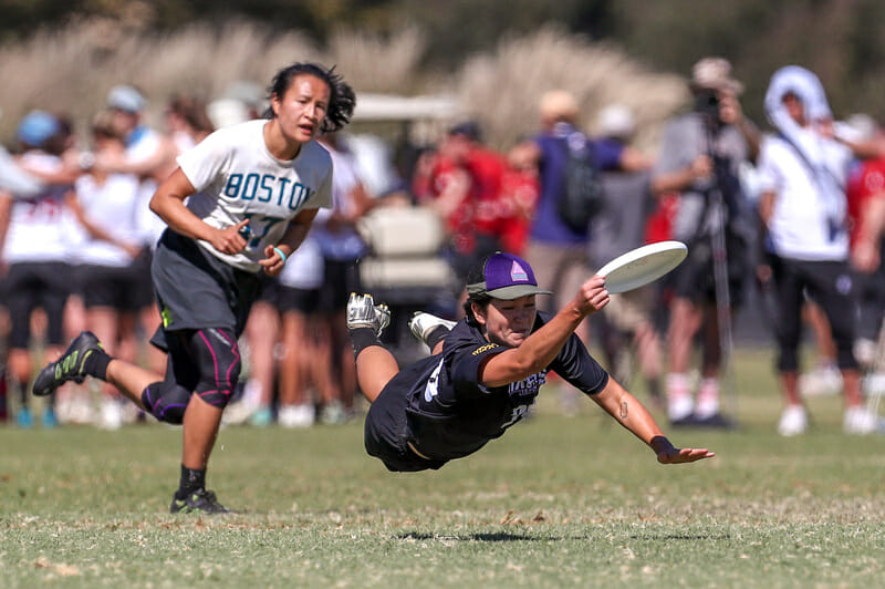 6ixers Lauren Kimura takes to the air against Brute Squad at the 2018 Club National Championships.