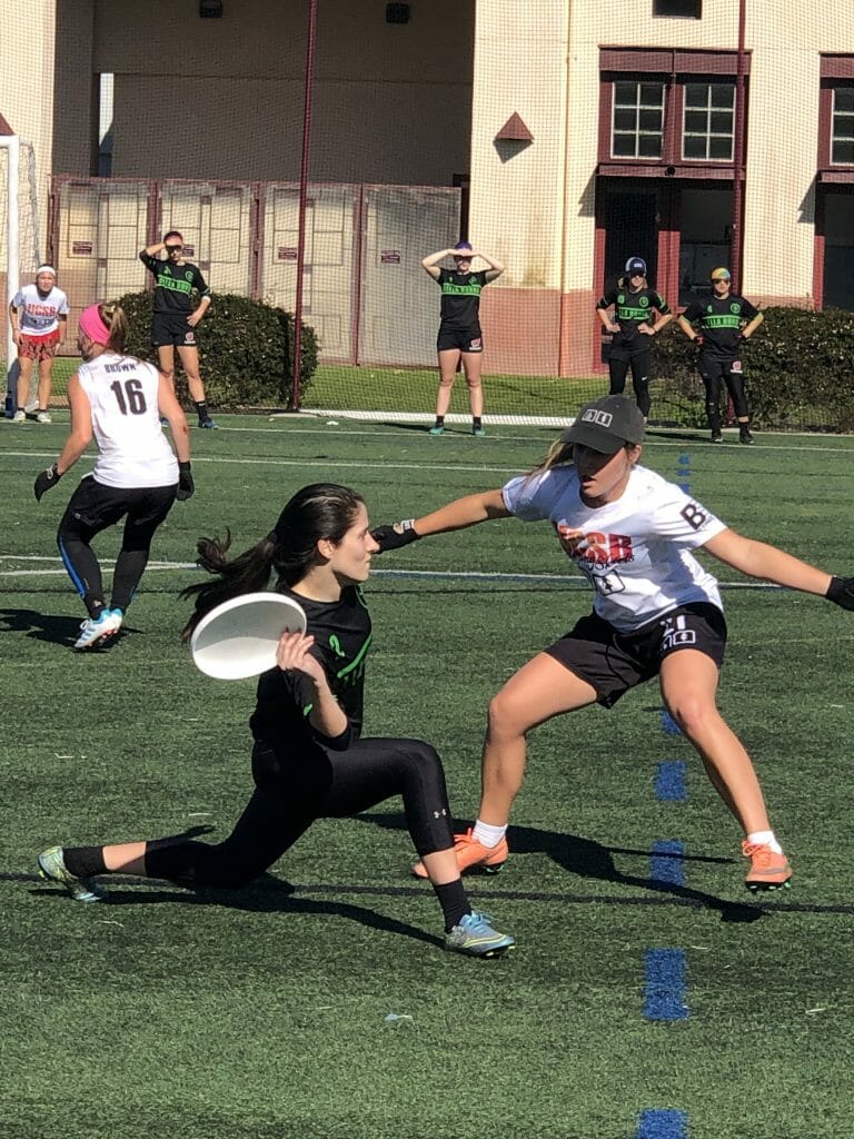 Wisconsin's Sabrina Hoffman throws against UC Santa Barbara's Mikaela Leslie at the 2019 Santa Barbara Invite.