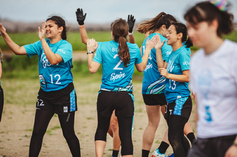 UCLA BLU's Emily Beck celebrates with her teammates at Stanford Invite 2019.