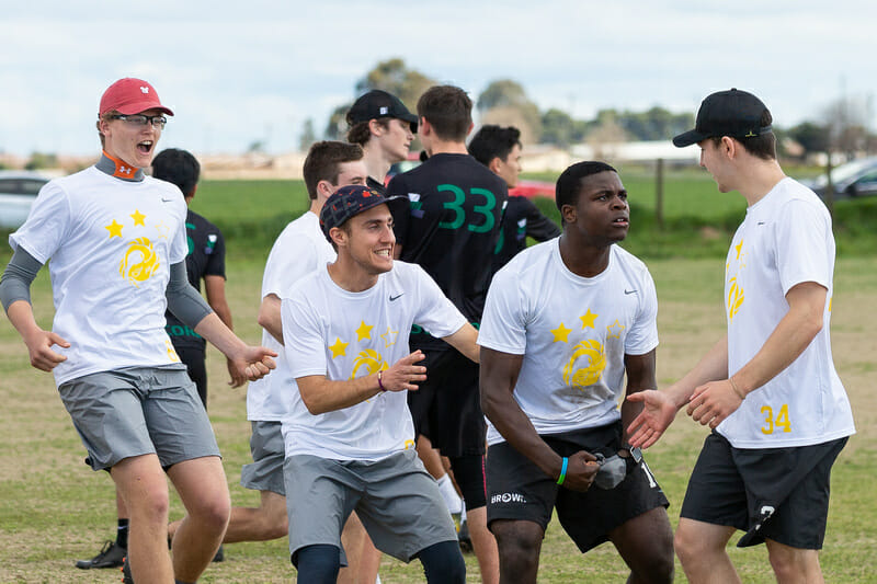 Brown's Azeez Adeyemi flexes as his teammates get hype at Stanford Invite 2019.