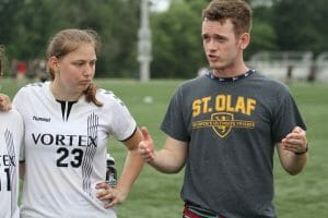 Sean Pritchard, one of three St. Olaf coaches, addresses Vortex in a huddle at the 2019 D-III College Championships. Photo: William 'Brody' Brotman -- UltiPhotos.com