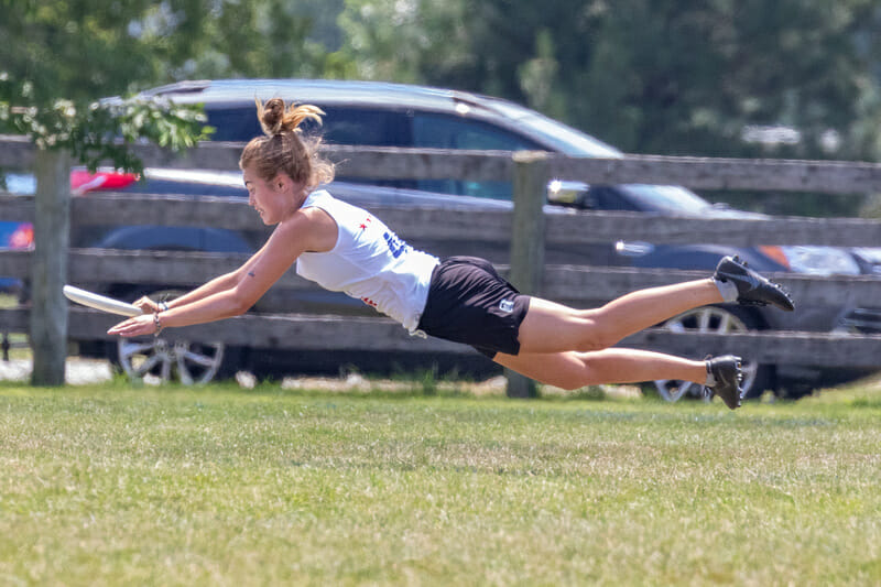 Kennedy McCarthy of Boston Siege makes the layout catch at Select Flight Invite East 2019. Photo: Kevin Wayner -- UltiPhotos.com