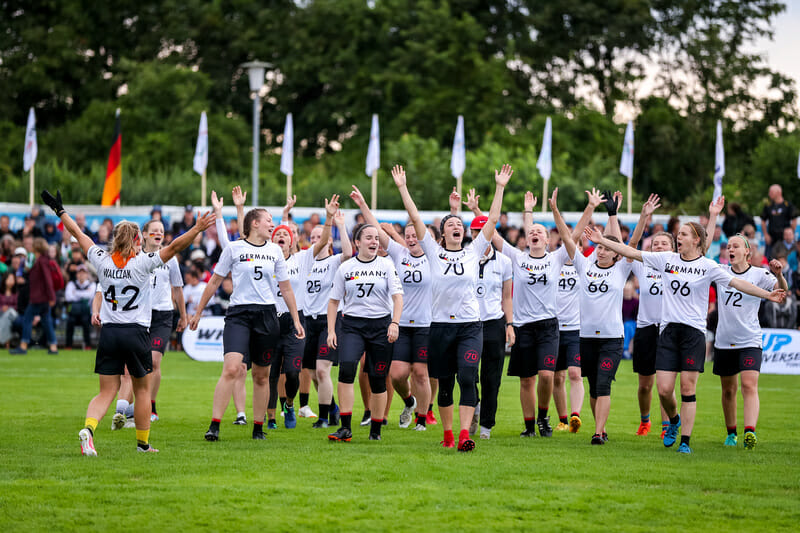 The German women's team take the field for the opening showcase game of the WFDF 2019 U24 World Championships. Photo: Paul Rutherford -- UltiPhotos.com