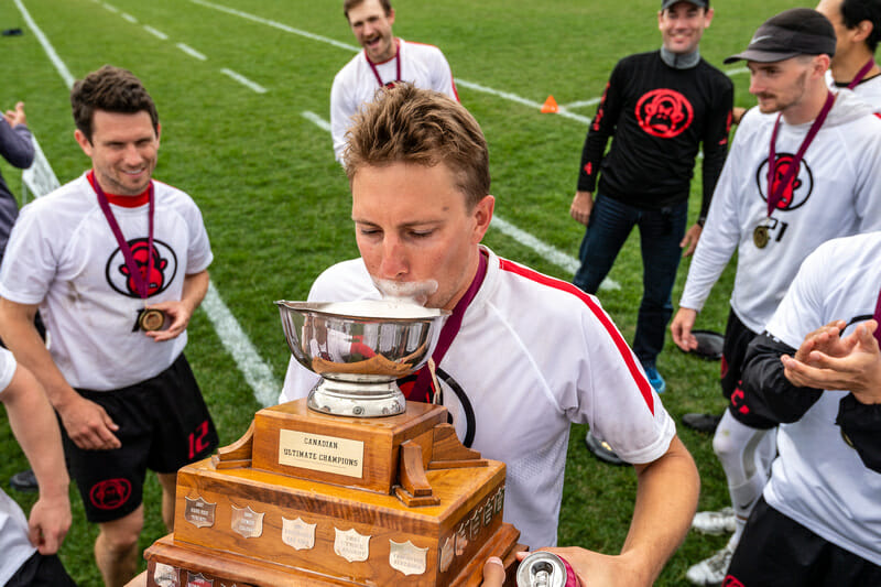 Furious George drinks from the trophy after winning the 2019 Canadian Ultimate Championships. Photo: Jeff Bell -- UltiPhotos.com
