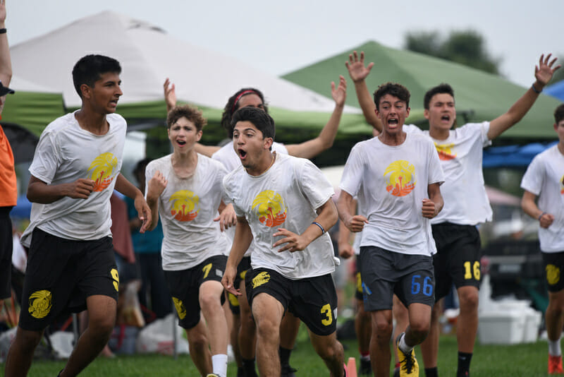 Players from Seattle Horizon celebrate their semifinal victory, which would be enough to share the U17 national title. Photo: Jolie J Lang -- UltiPhotos.com
