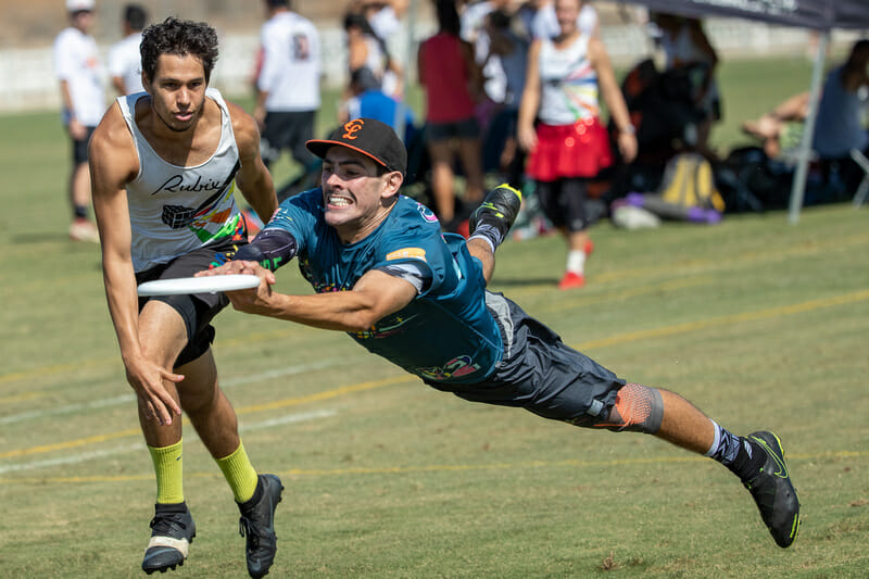 San Francisco Classy's Joel Anton grits his teeth to brace for impact after the layout at 2019 Southwest Club Regionals. Photo: Rodney Chen -- UltiPhotos.com