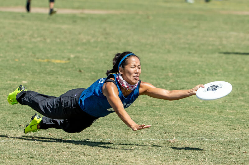 San Francisco Polar Bears' Linh Hoang makes the layout grab at 2019 Southwest Club Regionals. Photo: Rodney Chen -- UltiPhotos.com