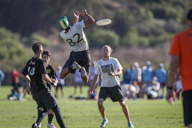 Rhino Slam's Leandro Marx — dominant for much of the quarterfinals — makes a critical drop on double game point. Photo: Paul Rutherford -- UltiPhotos.com