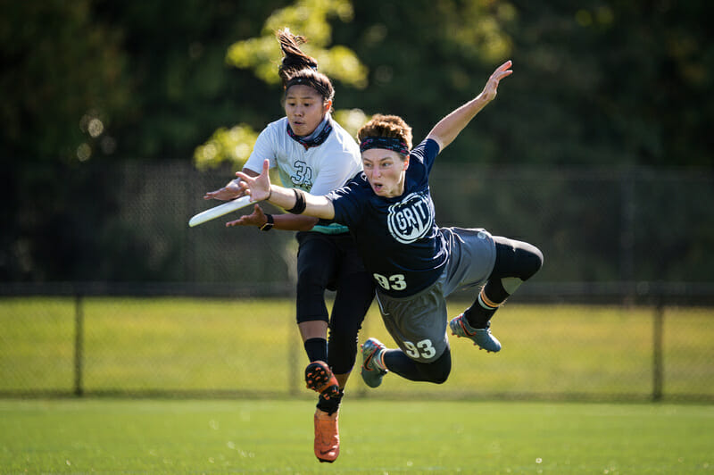 The focus from both players here is intense during the matchup between New Jersey Pine Baroness and Washington DC Grit at 2019 Mid-Atlantic Club Regionals. Photo: Paul Andris -- UltiPhotos.com