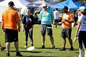 Dallas Public Enemy coach Adam Goff oversees the flip during pool play at the 2019 Club Championships. Photo: Kristina Geddert -- UltiPhotos.com