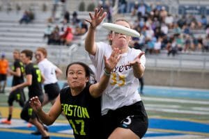 Boston Brute Squad's Angela Zhu goes for the block in the 2019 Club Championships final. Photo: Kristin Geddert -- UltiPhotos.com