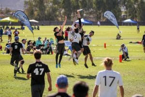 New York PoNY's Jeff Babbitt skies for a hugely important block late in their 2019 Club Championships quarterfinal comeback over Rhino Slam! Photo: Paul Rutherford -- UltiPhotos.com