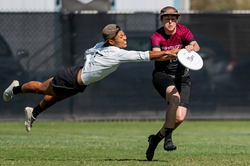 Opi Payne gets a block at the 2019 Club Championships. Photo: Sam Hotaling -- UltiPhotos.com