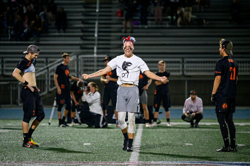 Sockeye's Dylan Freechild rejoices while Ring of Fire laments the results of the men's semifinals at the 2019 Club Championships. Photo: Sam Hotaling -- UltiPhotos.com