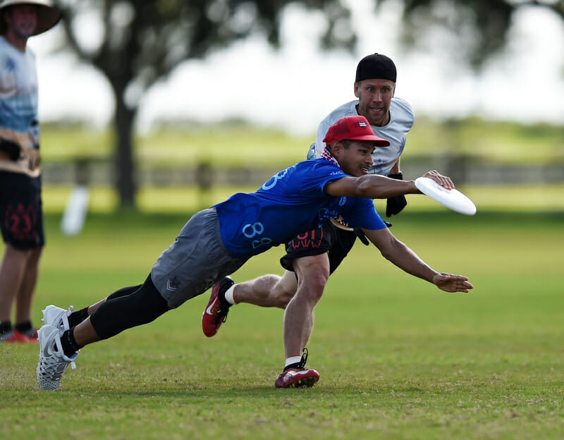 Unambiguously Grey's Calvin Oung makes a great grab at PAUC 2019. Photo: Billy Dzwonkowski -- UltiPhotos.com