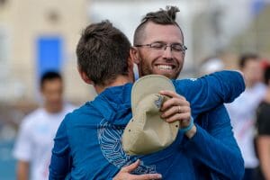 Seattle Sockeye coaches Mike Caldwell and David Hogan embrace after winning the 2019 Club Championships. Photo: Jeff Bell -- UltiPhotos.com