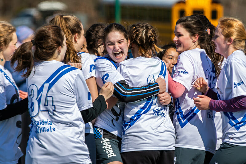 The Paideia Girls in an exuberant embrace at QCTU HS. Photo: Katie Cooper -- UltiPhotos.com